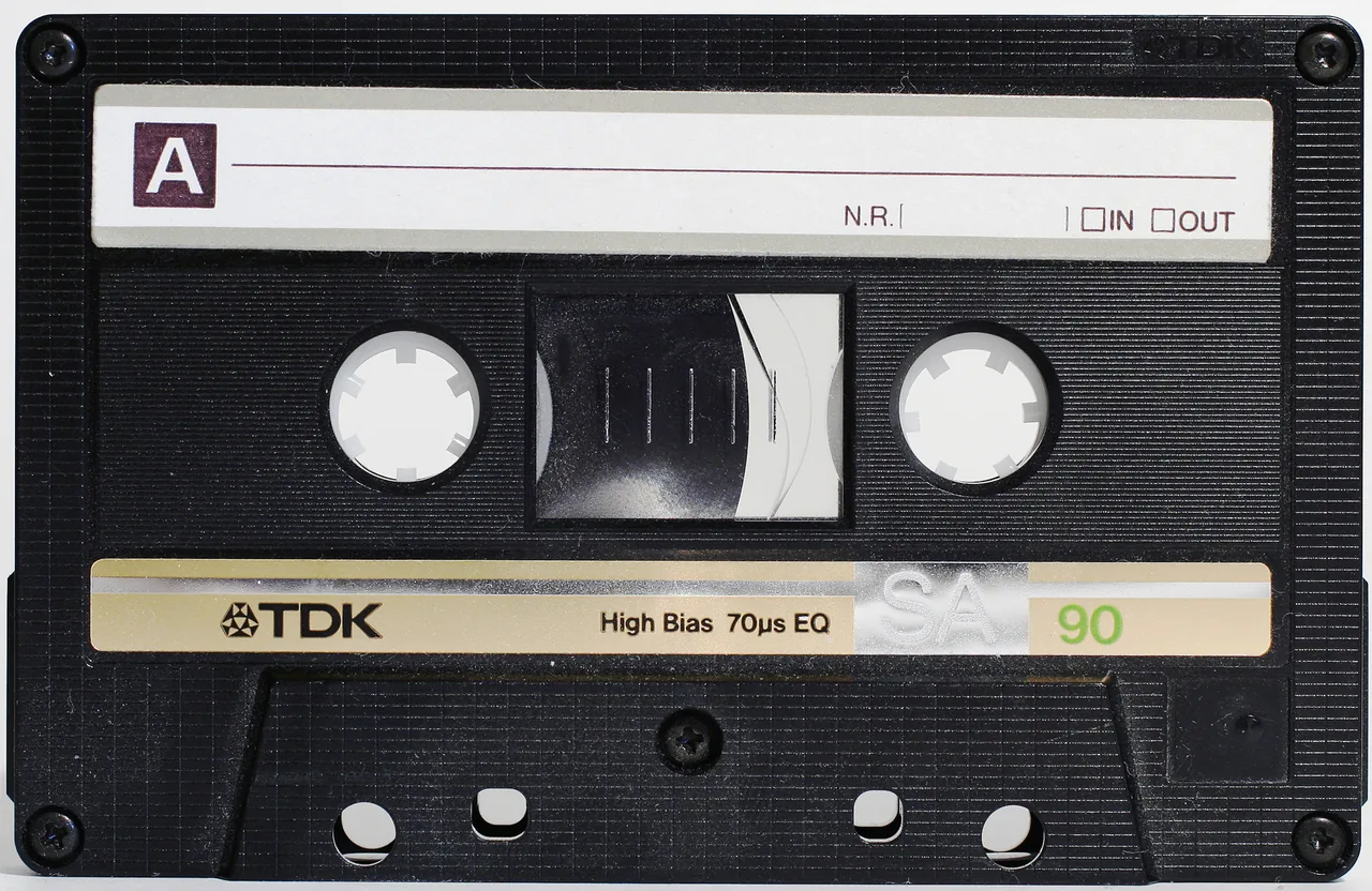 Vintage compact audio cassette representing the 1980s aesthetic revival